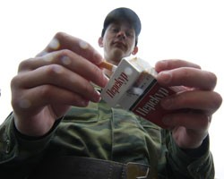Некурящий С.Шойгу исключит сигареты из солдатского довольствия